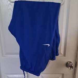 Nike Blue Track Pants with White Swoosh